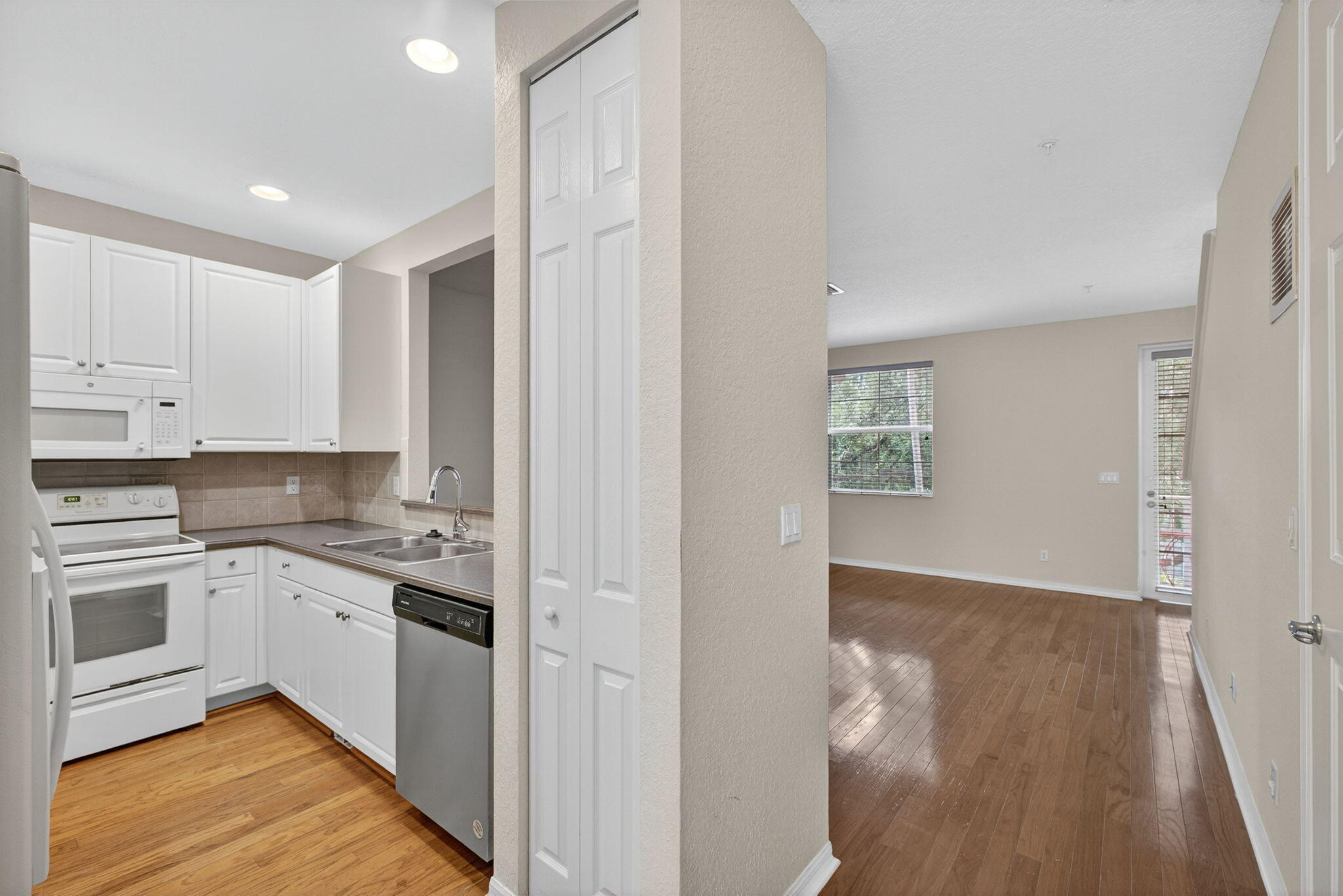 1562 Grande Cull Way Jupiter, FL 33458 - Photo 13 of 35 Kitchen and Living Room