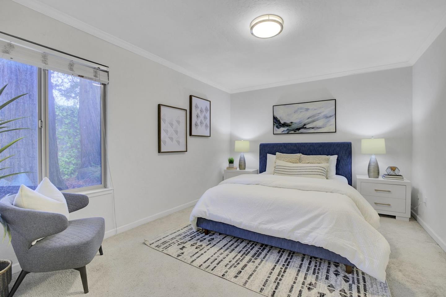 2742 Oak Road, Unit 191 Walnut Creek, CA 94597 - Photo 18 of 36 a bedroom with a large bed and a couch