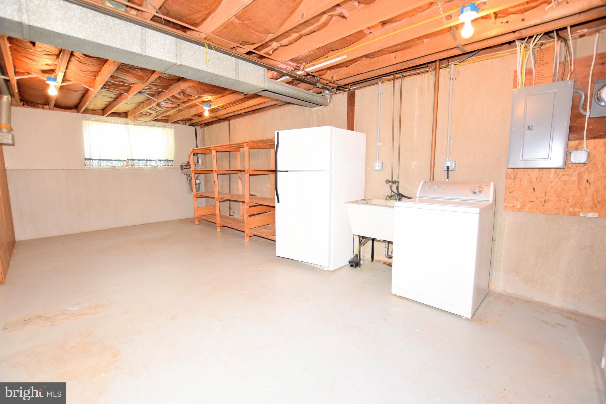 2510 Hanson Road Edgewood, MD 21040 - Photo 20 of 24 Huge Laundry Room w/ Storage & Extra Fridge!