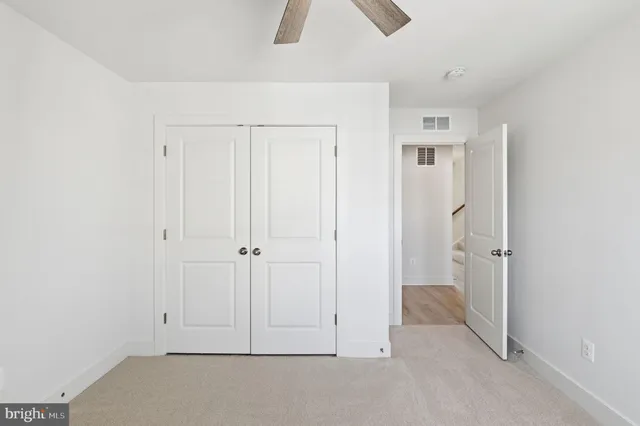 an empty room with closet