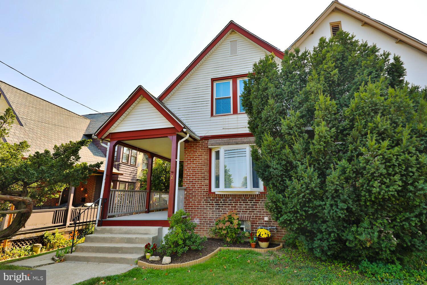 2 Township Line Road Jenkintown, PA 19027 - Photo 1 of 26 a view of a house with backyard and sitting area