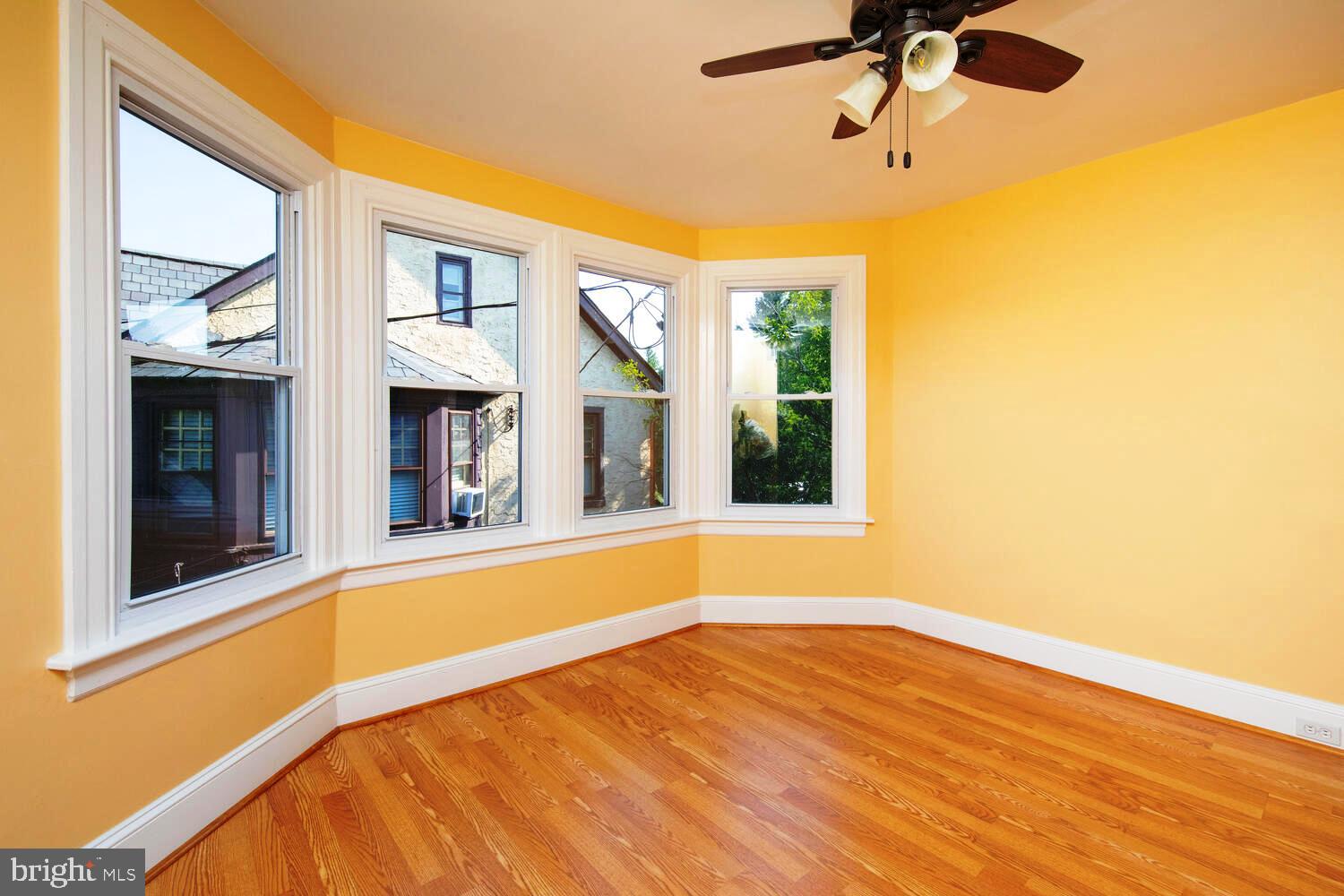 2 Township Line Road Jenkintown, PA 19027 - Photo 16 of 26 a view of a room with a large window and ceiling fan