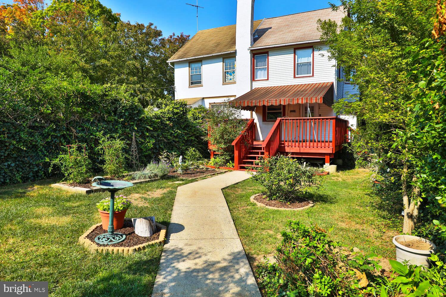 2 Township Line Road Jenkintown, PA 19027 - Photo 23 of 26 a view of a house with backyard sitting area and swimming pool
