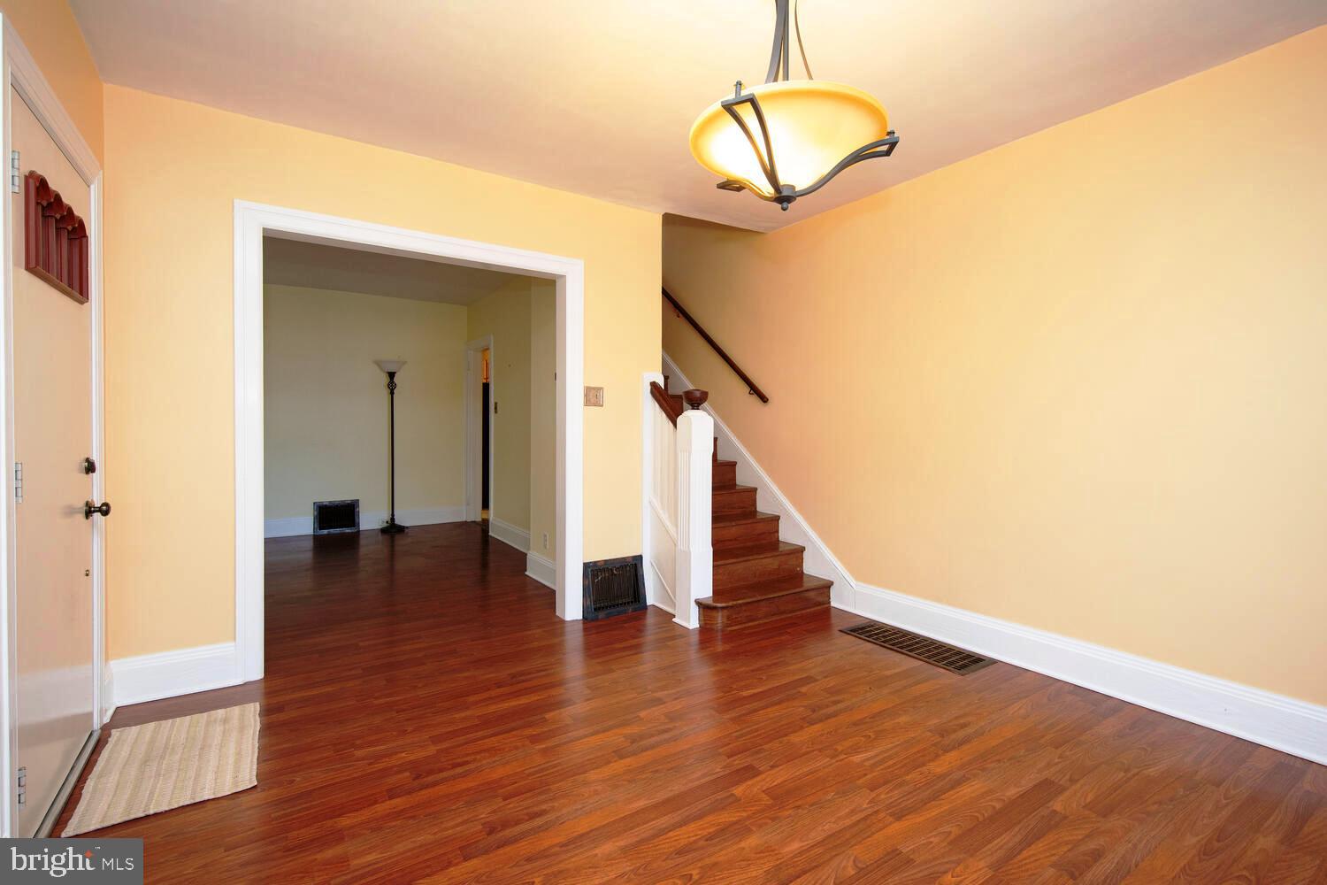 2 Township Line Road Jenkintown, PA 19027 - Photo 3 of 26 a view of a room with wooden floor and staircase