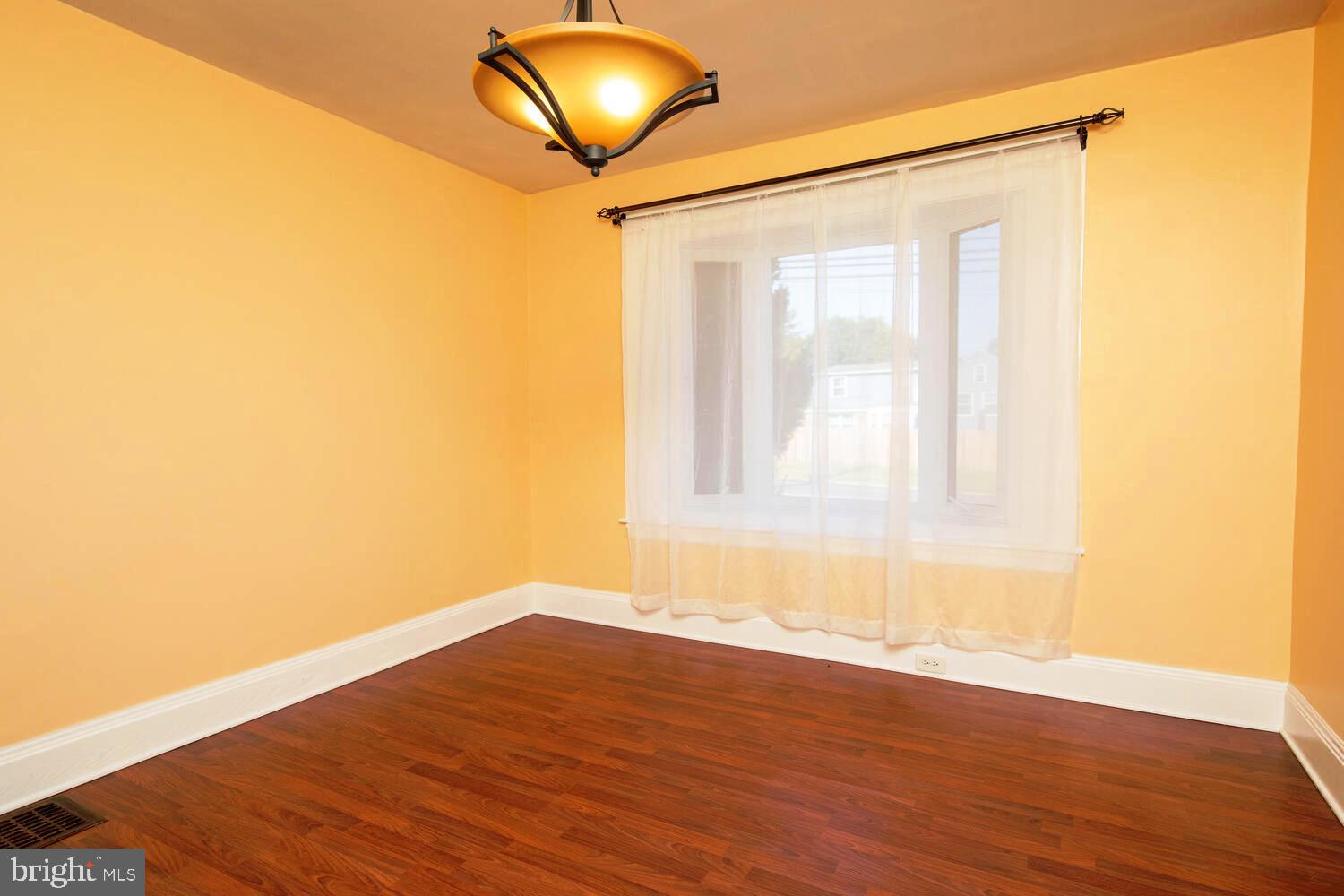 2 Township Line Road Jenkintown, PA 19027 - Photo 6 of 26 a view of empty room with wooden floor and fan