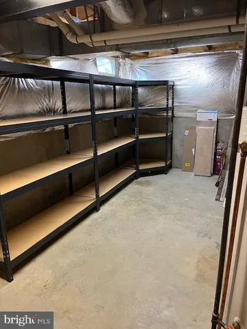 a view of an empty room with stairs