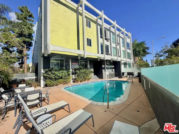 a building outdoor space with patio furniture