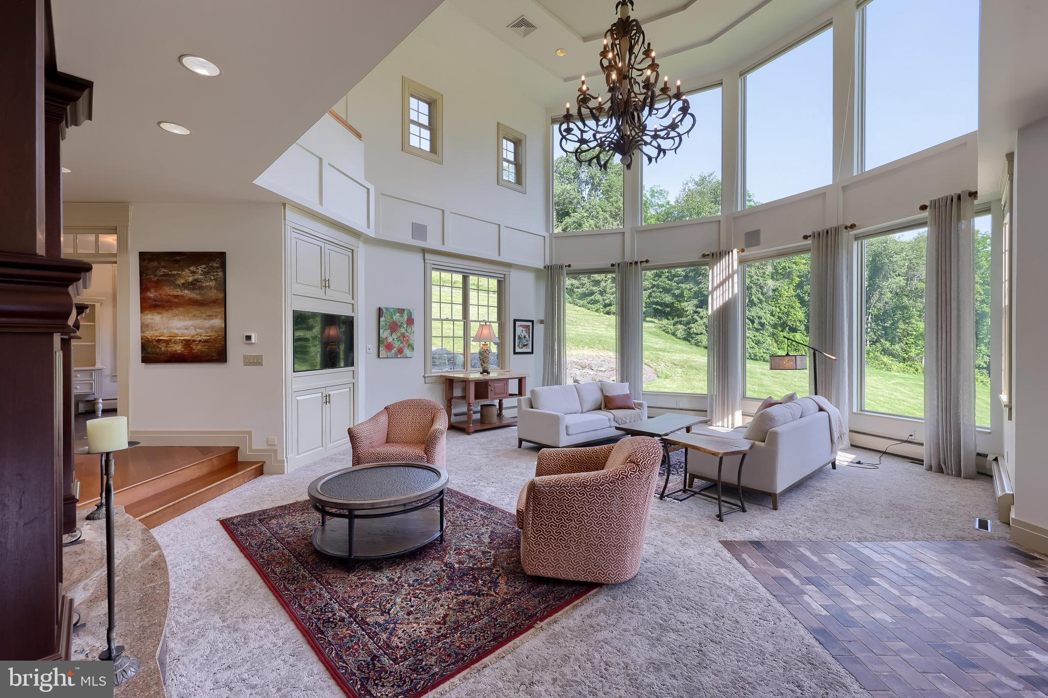 5751 Mt Pisgah Road York, PA 17406 - Photo 13 of 144 a living room with furniture or chandelier and a large window