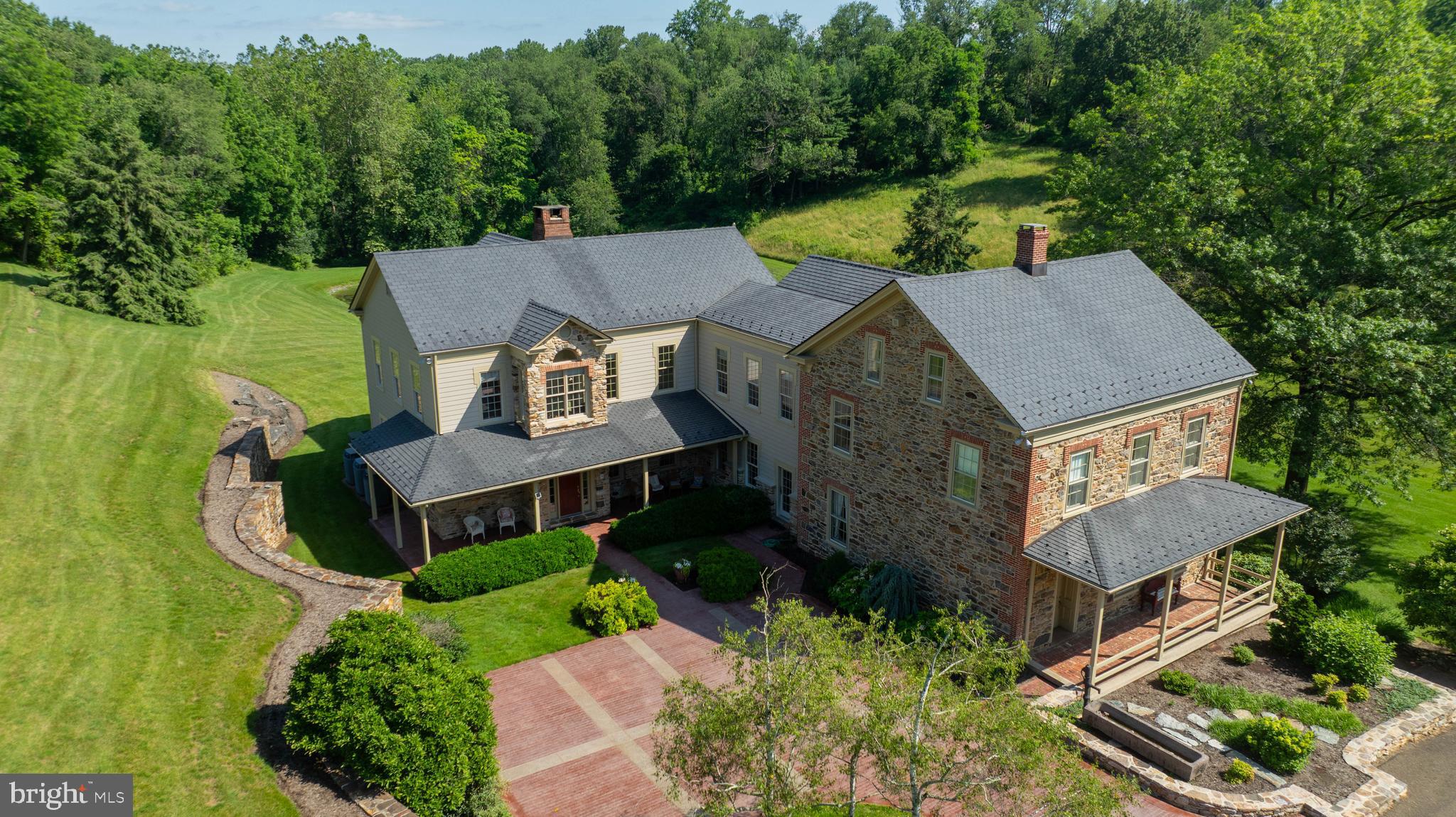 5751 Mt Pisgah Road York, PA 17406 - Photo 143 of 144 an aerial view of a house with a big yard and large tree