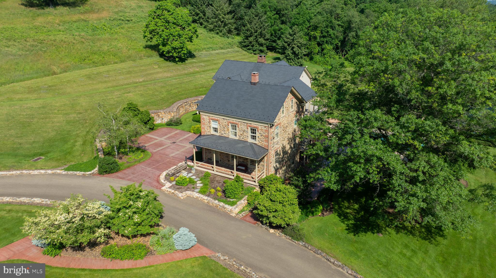 5751 Mt Pisgah Road York, PA 17406 - Photo 144 of 144 an aerial view of a house with garden space and trees all around