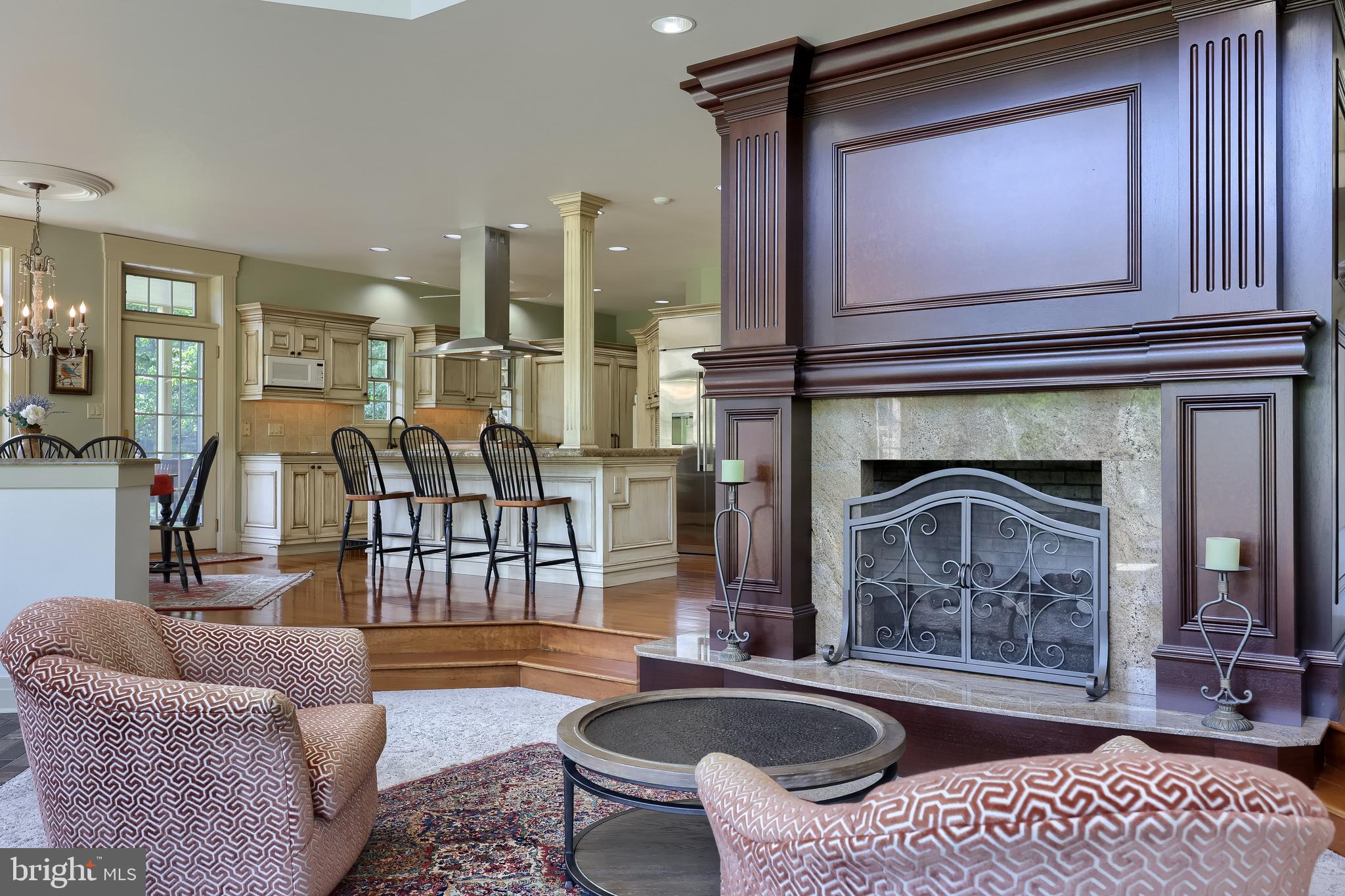 5751 Mt Pisgah Road York, PA 17406 - Photo 18 of 144 a living room with furniture a flat screen tv and a fireplace