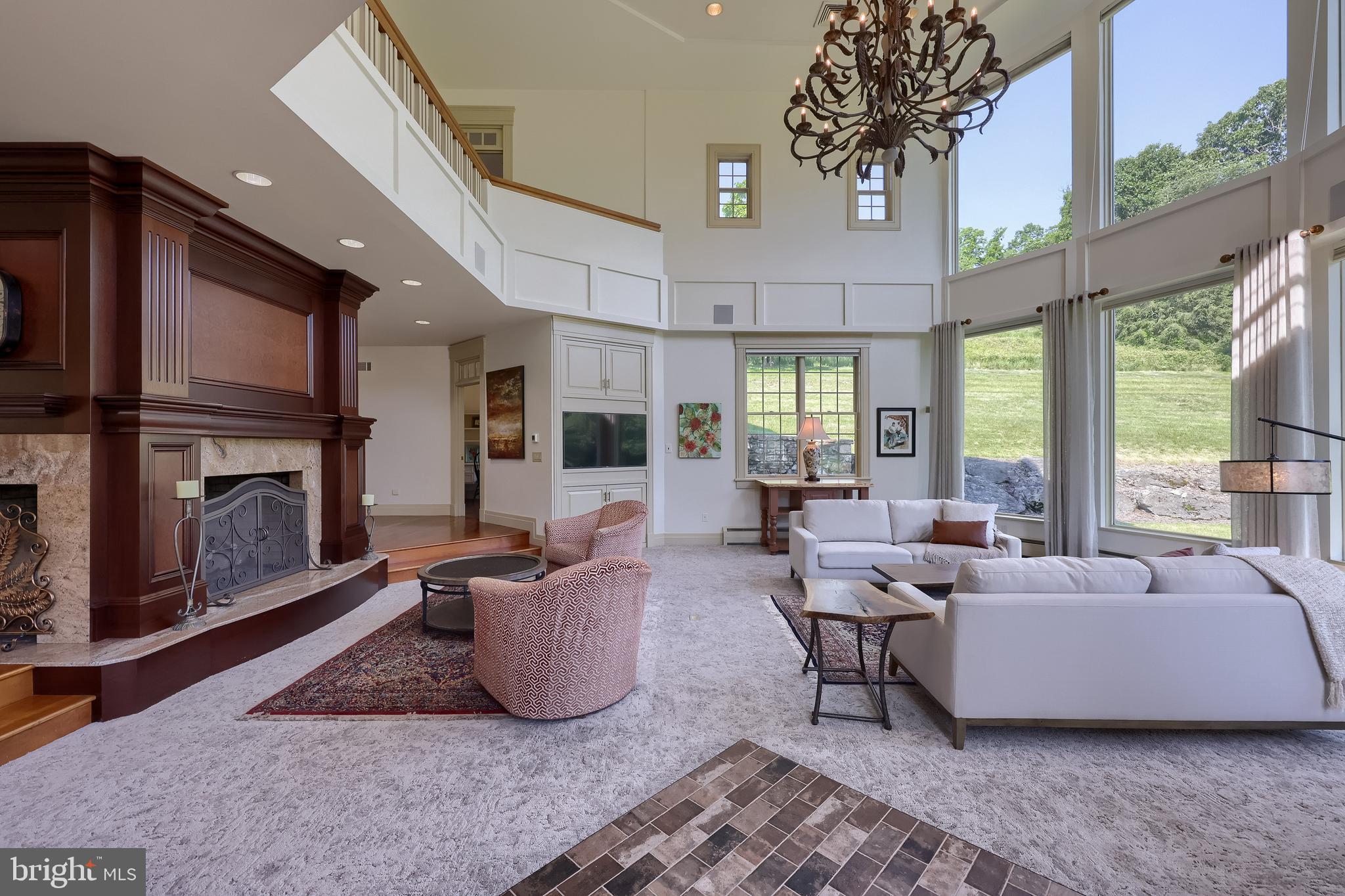 5751 Mt Pisgah Road York, PA 17406 - Photo 26 of 144 a living room with furniture and a fireplace
