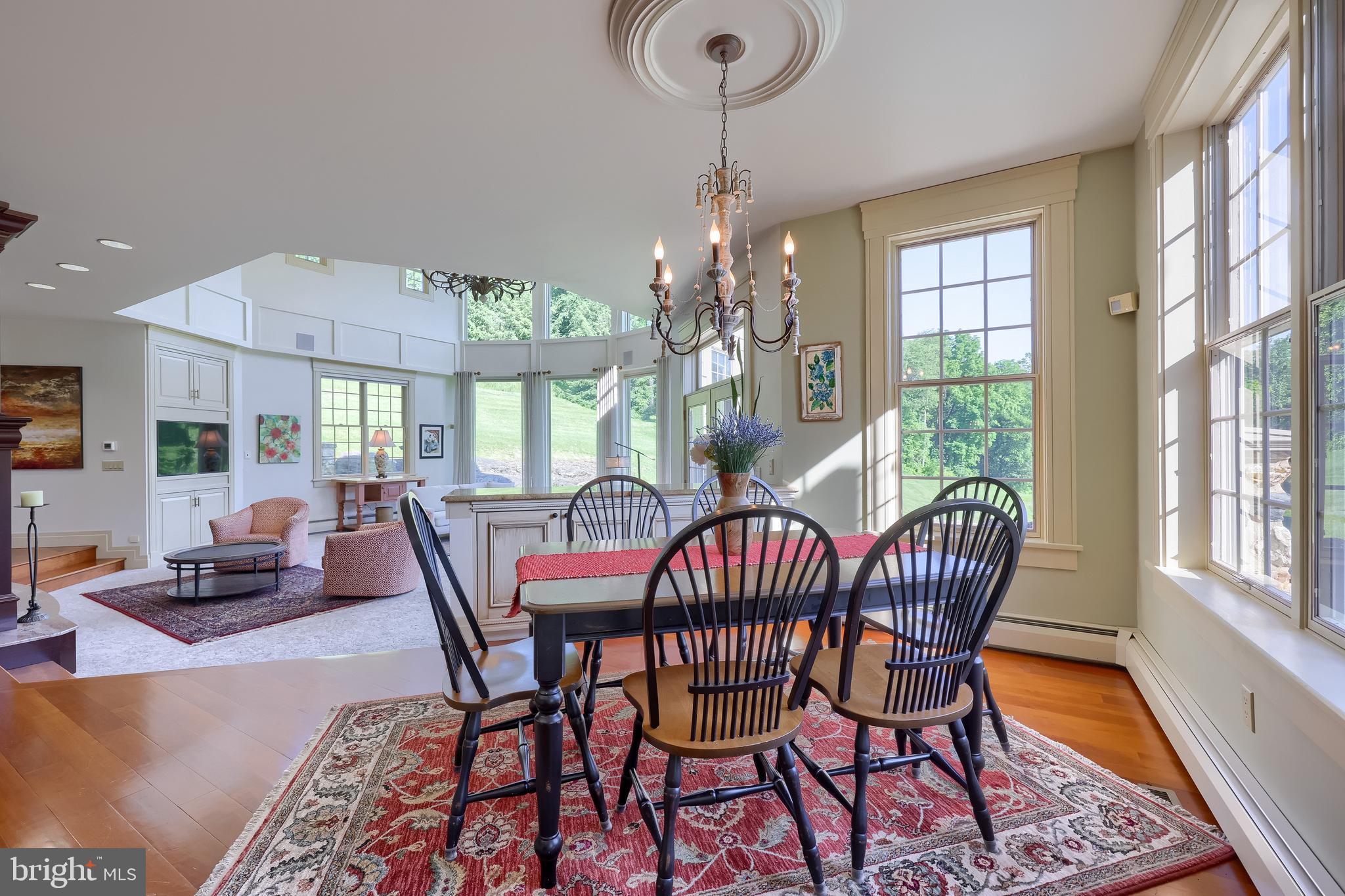 5751 Mt Pisgah Road York, PA 17406 - Photo 28 of 144 a view of a dining room with furniture window and wooden floor