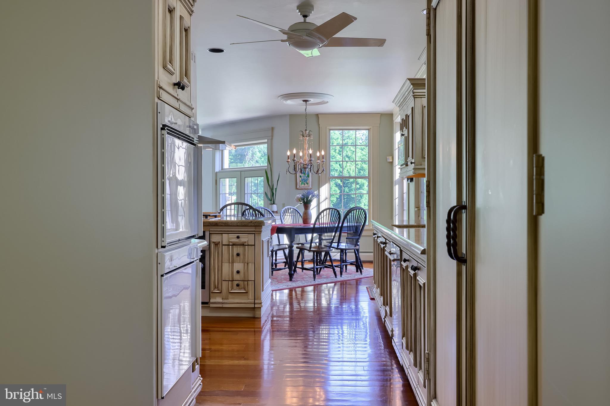 5751 Mt Pisgah Road York, PA 17406 - Photo 42 of 144 a view of a dining room with furniture window and wooden floor
