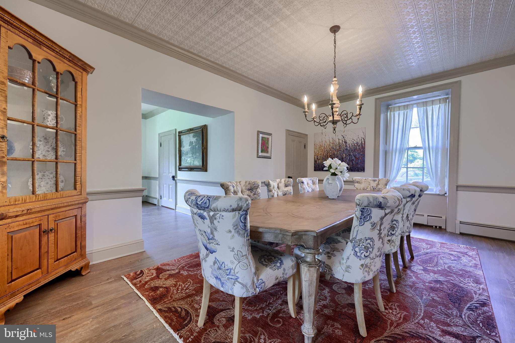 5751 Mt Pisgah Road York, PA 17406 - Photo 45 of 144 a view of a dining room with furniture window and wooden floor