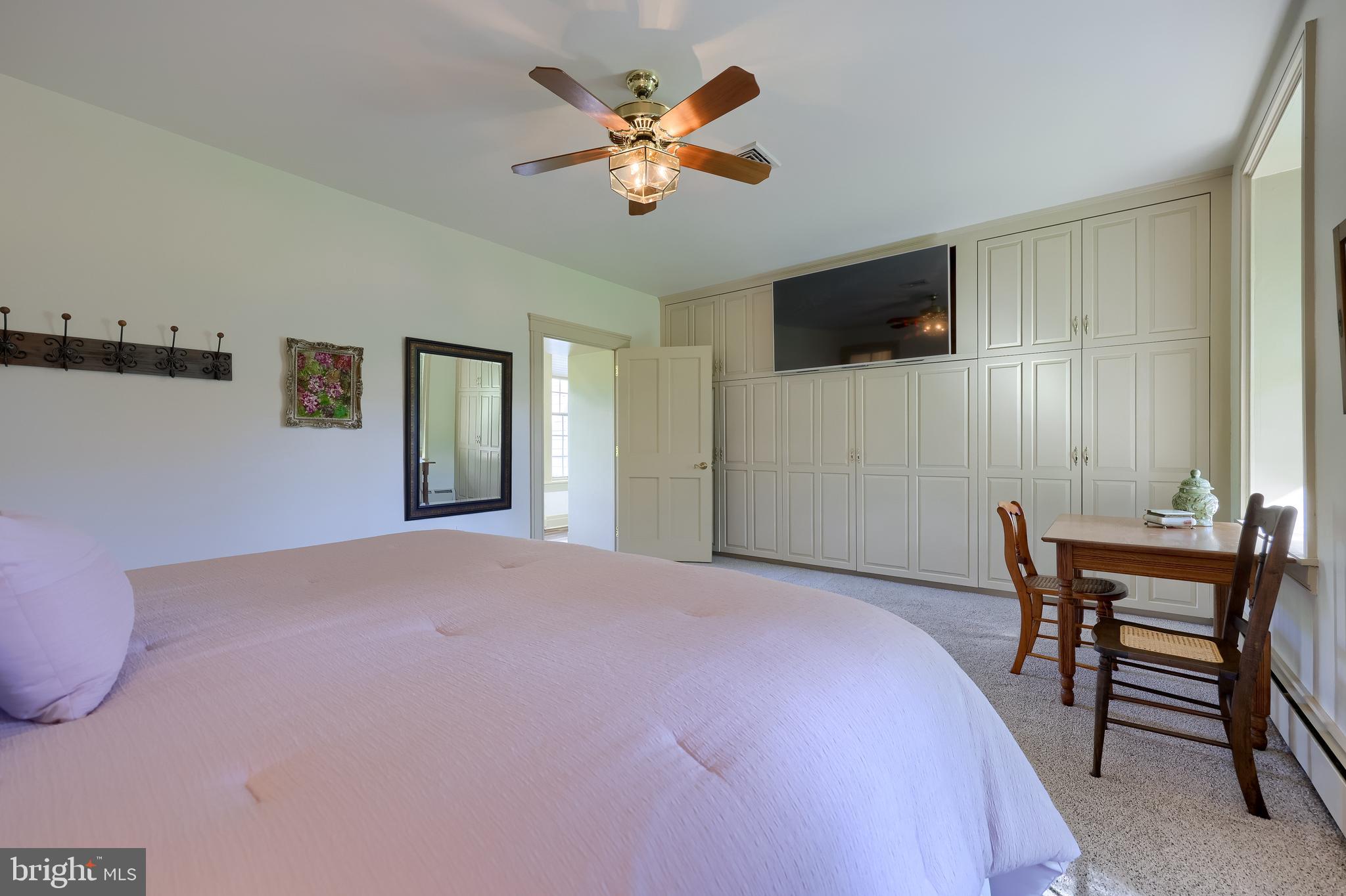 5751 Mt Pisgah Road York, PA 17406 - Photo 62 of 144 a bedroom with a bed and a flat screen tv