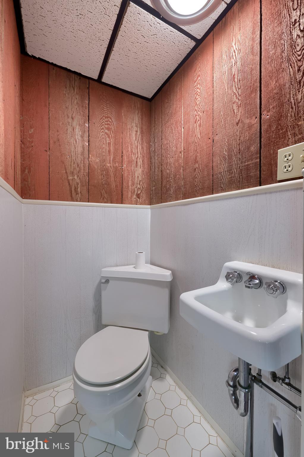 5751 Mt Pisgah Road York, PA 17406 - Photo 92 of 144 a bathroom with a sink a toilet and mirror