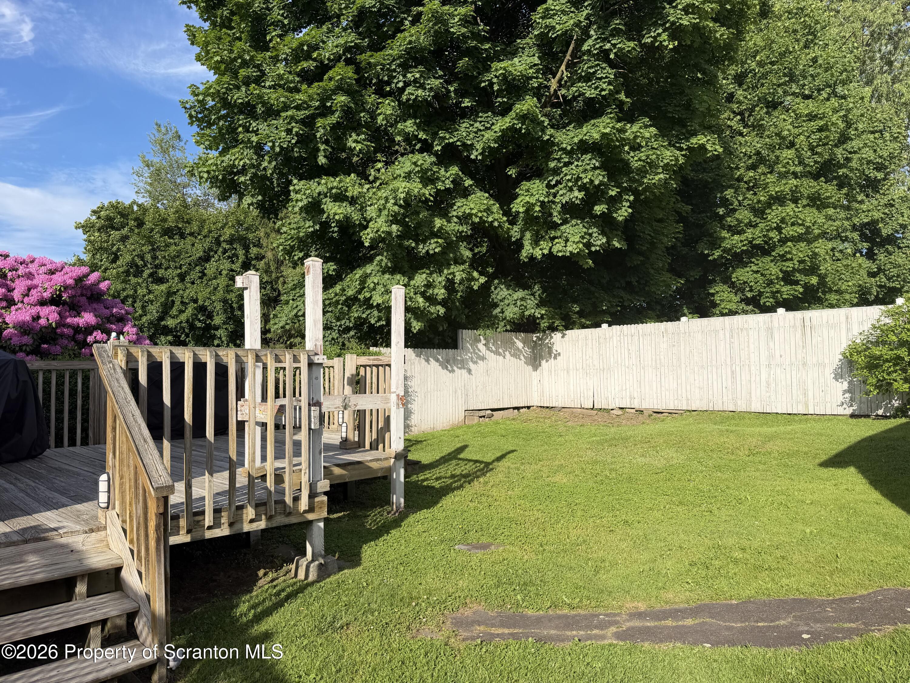 320 Haverly Street Throop, PA 18512 - Photo 26 of 27 a view of a deck with a yard