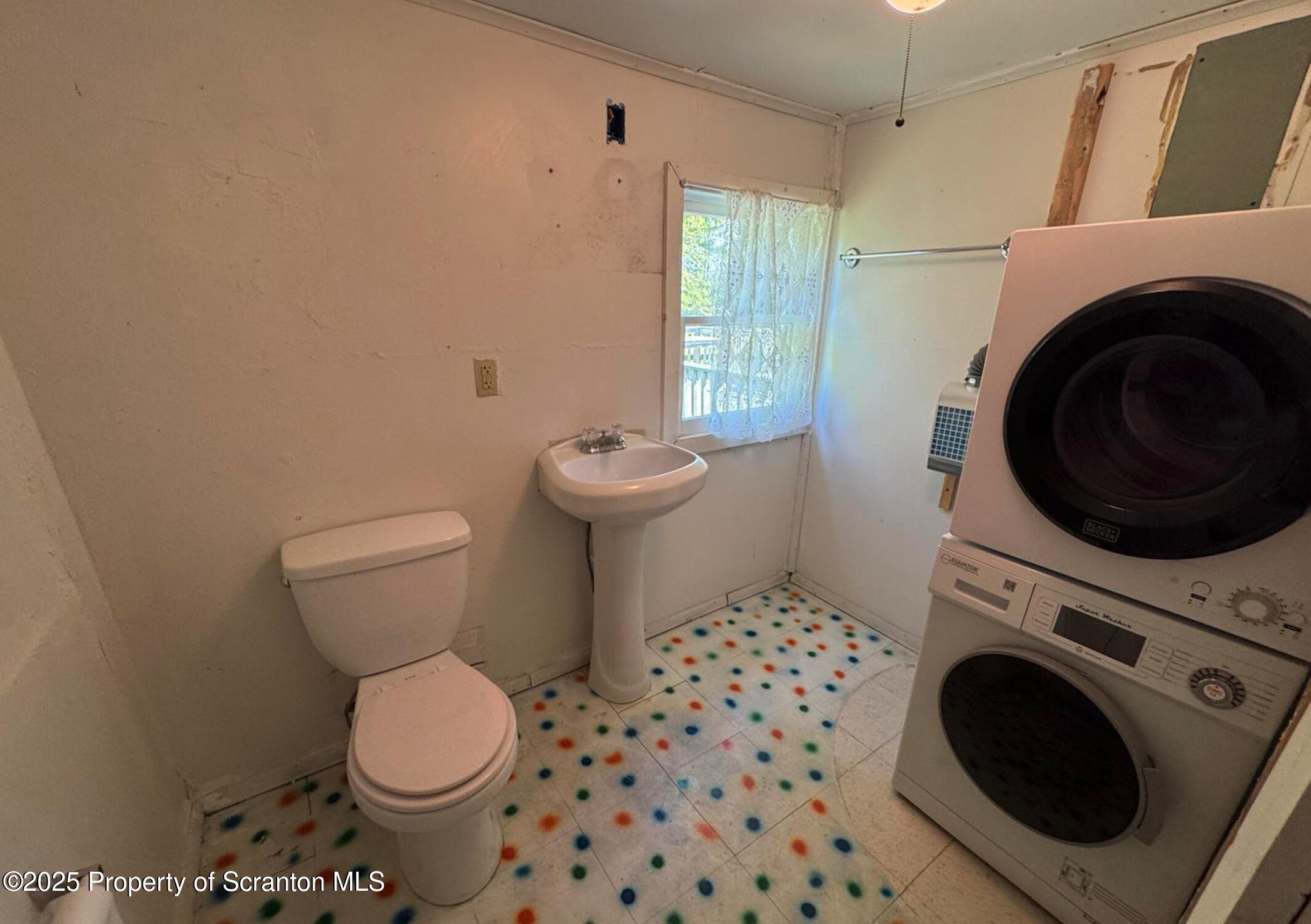 394 Dennis Road Honesdale, PA 18431 - Photo 8 of 13 a bathroom with a sink and a toilet