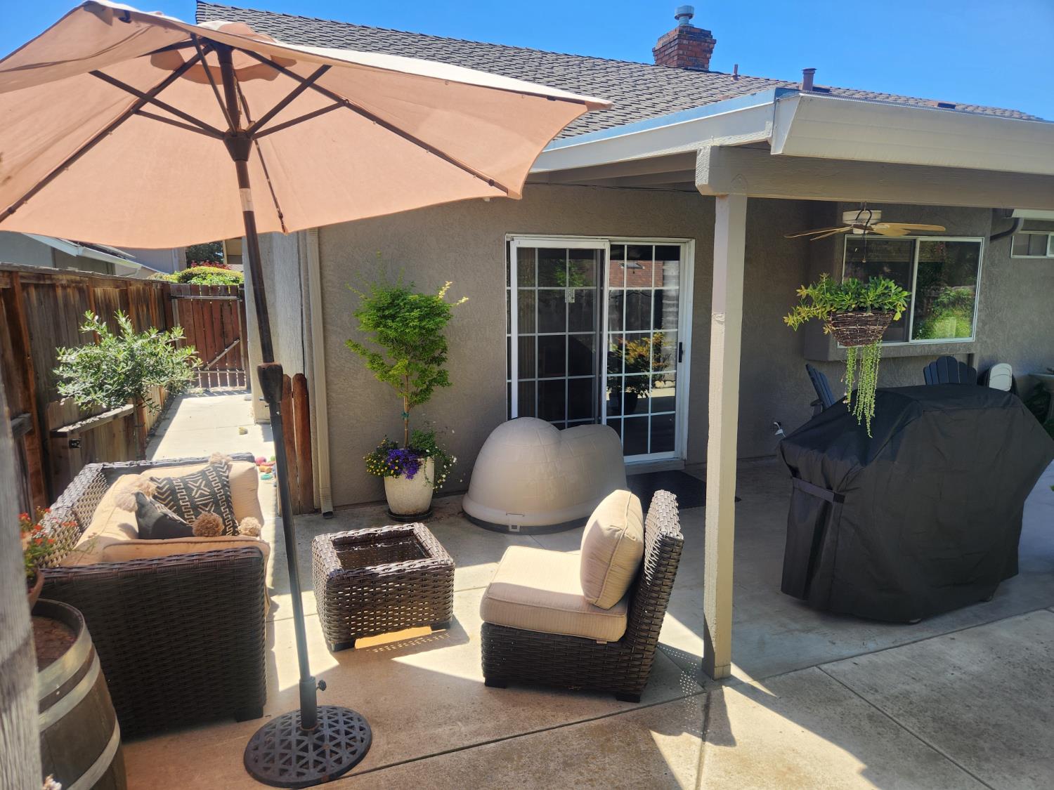777 Jordanolo Drive Ripon, CA 95366 - Photo 41 of 61 a outdoor living space with furniture and a potted plant