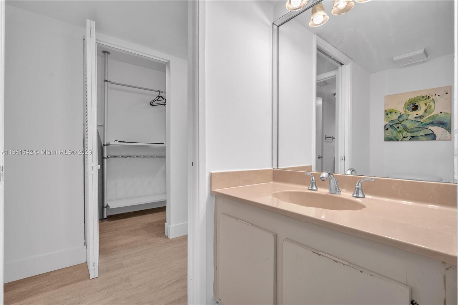 Omni Miami, FL 33132 - Photo 15 of 22 a bathroom with a sink and a mirror