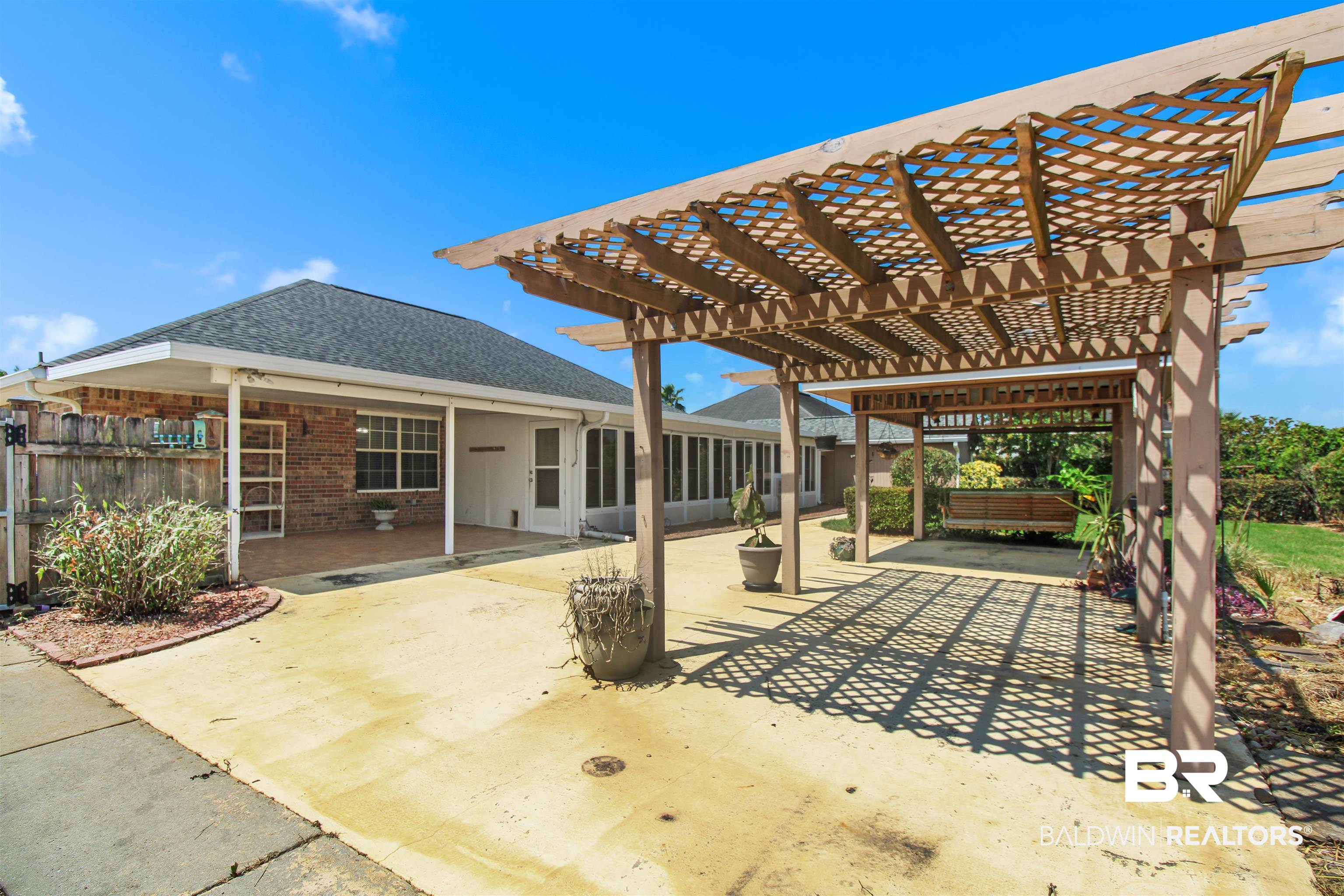 412 Collinwood Loop Foley, AL 36535 - Photo 5 of 23 View of patio featuring a pergola
