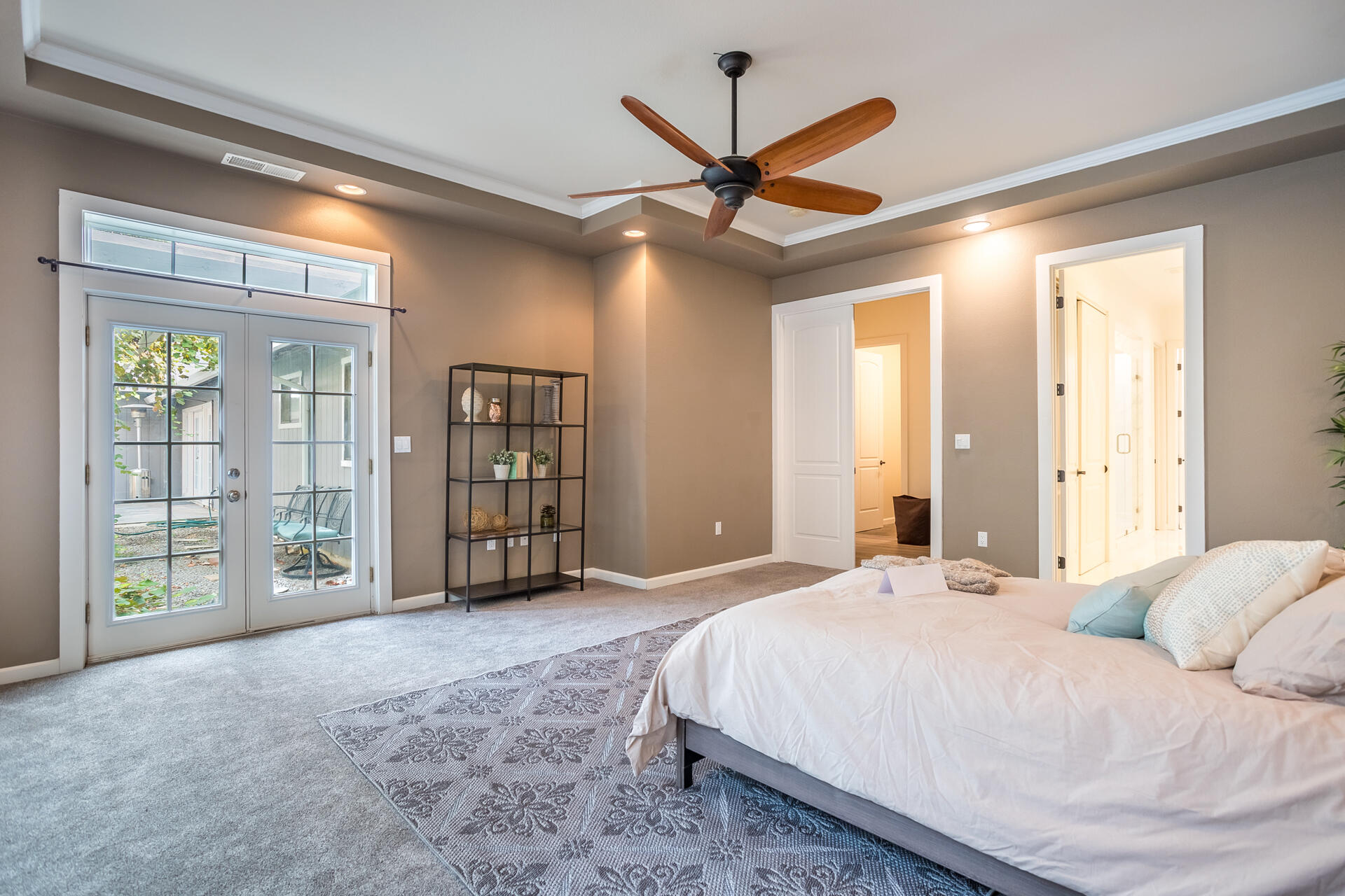 1102 Hope Lane Redding, CA 96003 - Photo 12 of 29 a spacious bedroom with a large bed and a large window
