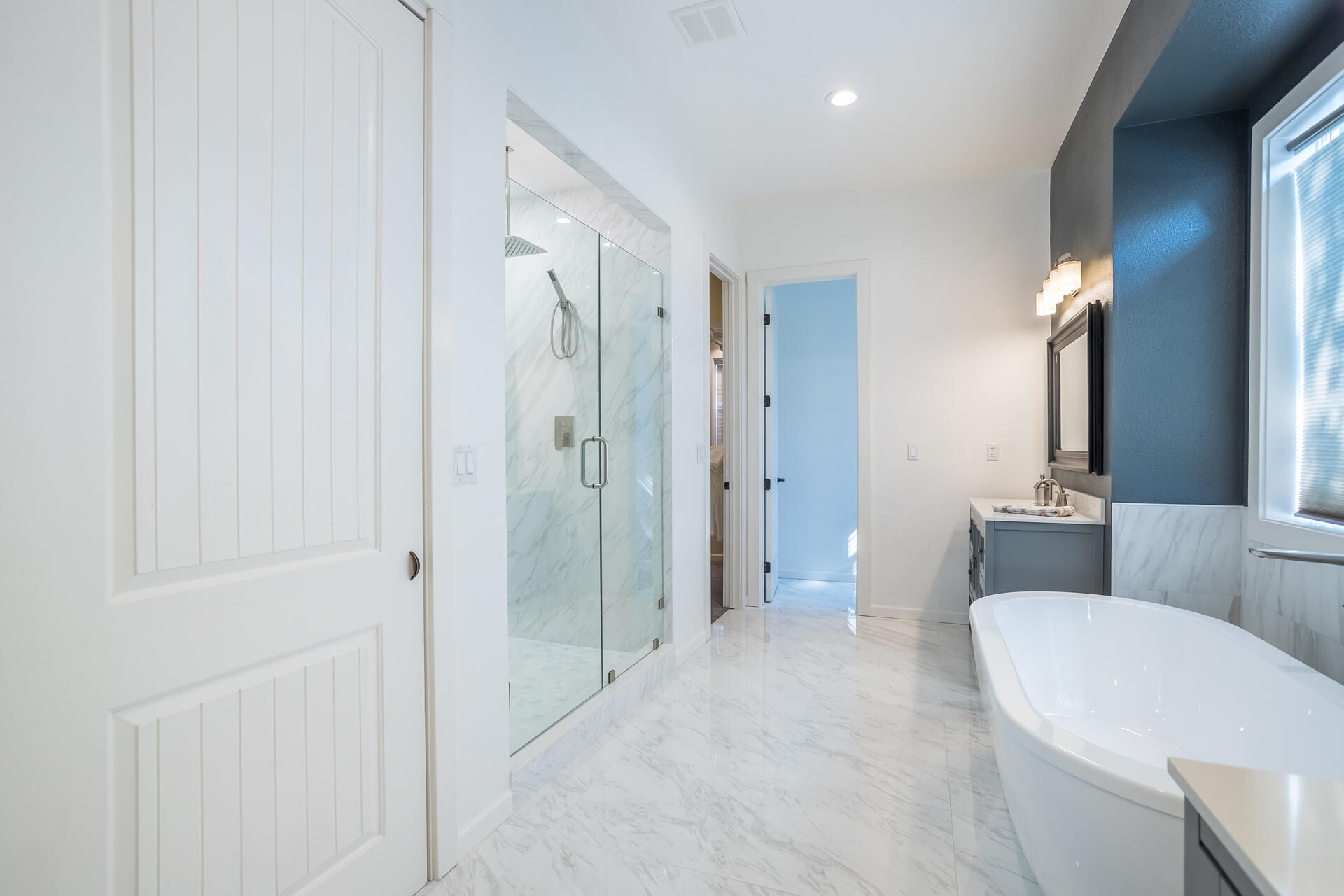 1102 Hope Lane Redding, CA 96003 - Photo 13 of 29 a bathroom with a double vanity sink toilet and shower