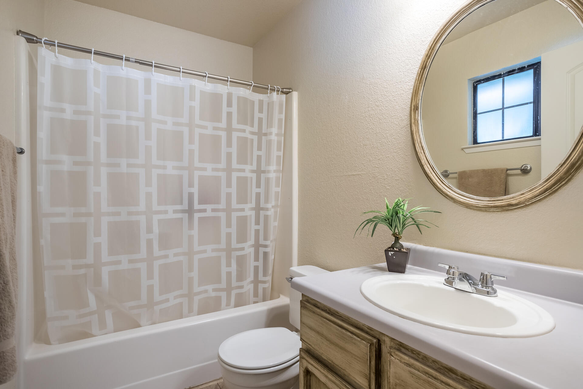 1102 Hope Lane Redding, CA 96003 - Photo 17 of 29 a bathroom with a sink a toilet and a mirror