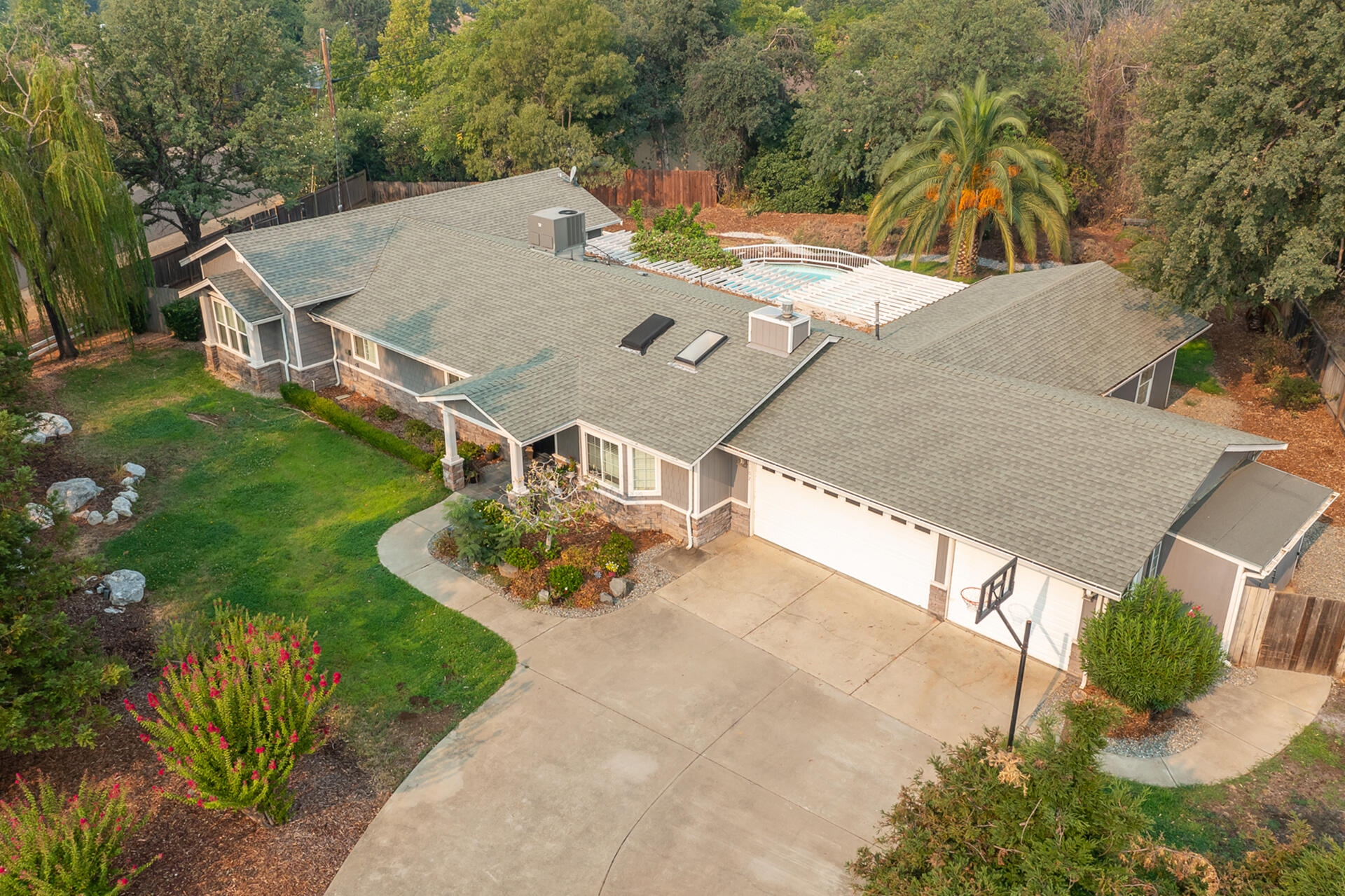 1102 Hope Lane Redding, CA 96003 - Photo 27 of 29 an aerial view of a house with backyard space and balcony