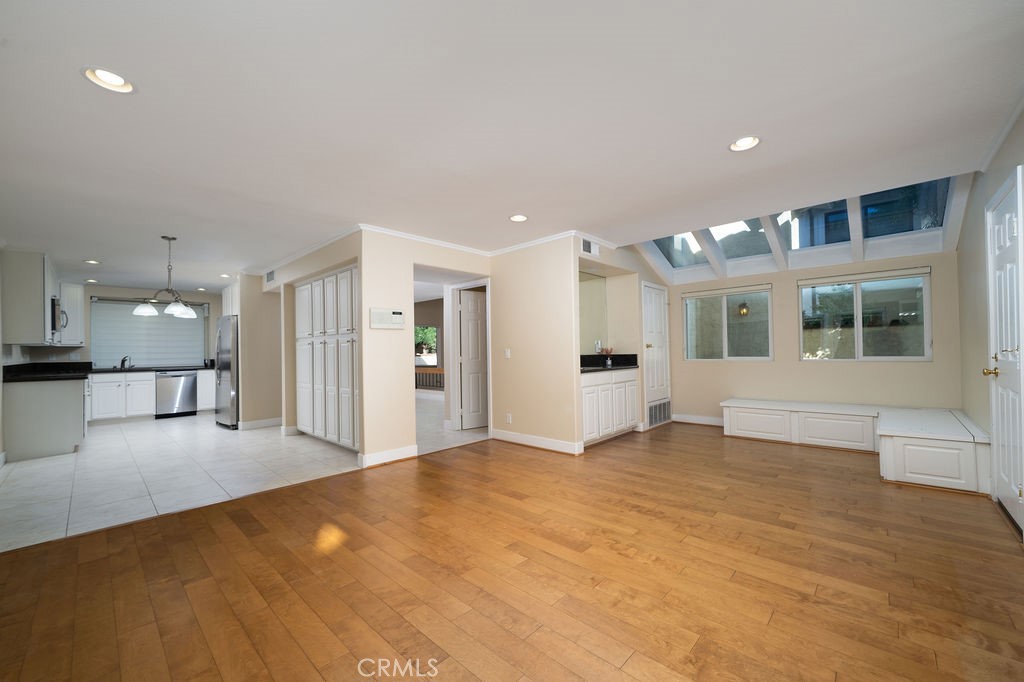 34 Columbus Irvine, CA 92620 - Photo 11 of 33 a view of an empty room with kitchen and a window