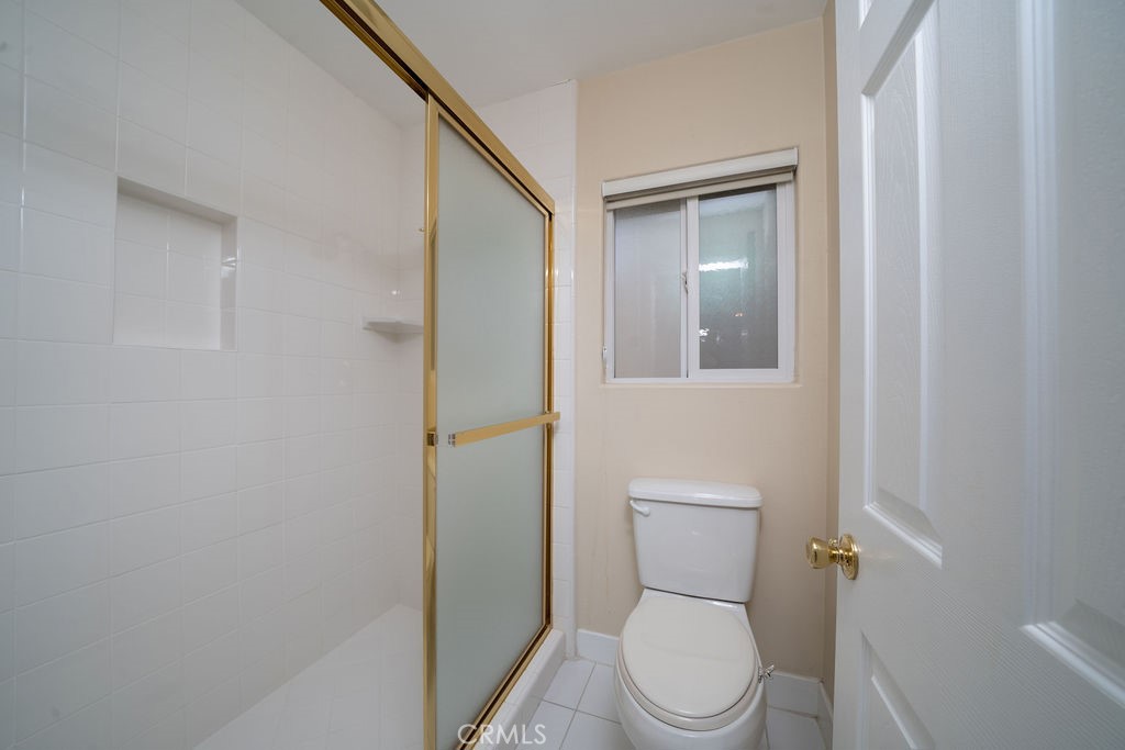 34 Columbus Irvine, CA 92620 - Photo 22 of 33 a white toilet sitting next to a bathroom sink