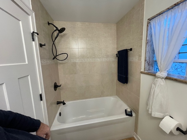 446 East 90th Street Chicago, IL 60619 - Photo 15 of 33 a bathroom with a shower and a bath tub