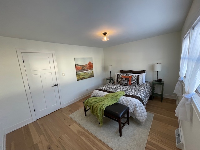 446 East 90th Street Chicago, IL 60619 - Photo 17 of 33 a bedroom with a bed and a couch