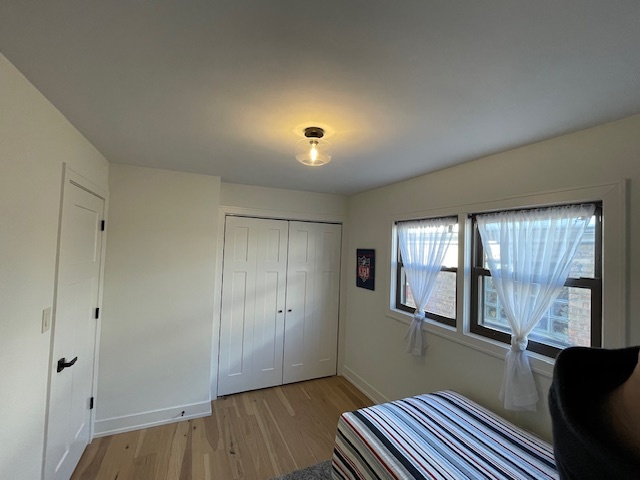446 East 90th Street Chicago, IL 60619 - Photo 22 of 33 a view of empty room with wooden floor and fan