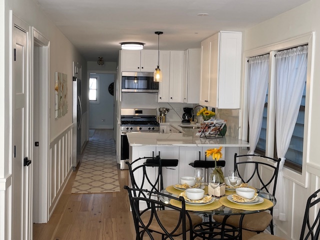 446 East 90th Street Chicago, IL 60619 - Photo 5 of 33 a view of a dining room with furniture