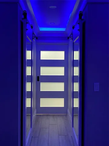 a bathroom with a sink a mirror and a shower