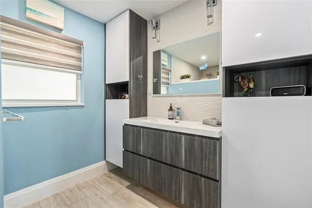 a bathroom with a bath tub