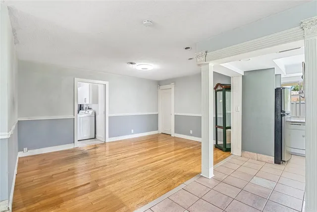 a view of a livingroom with wooden floor