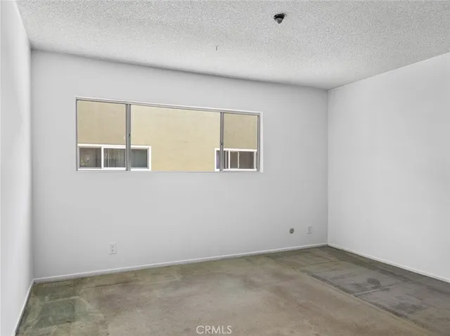 an empty room with mirror