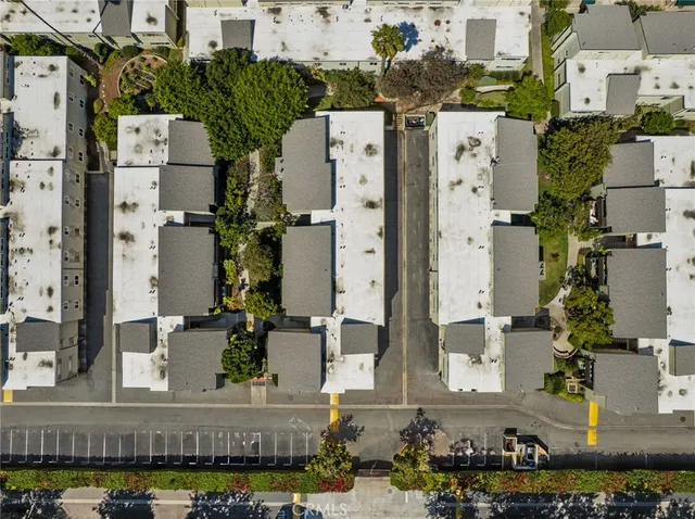 an aerial view of a house with a garden