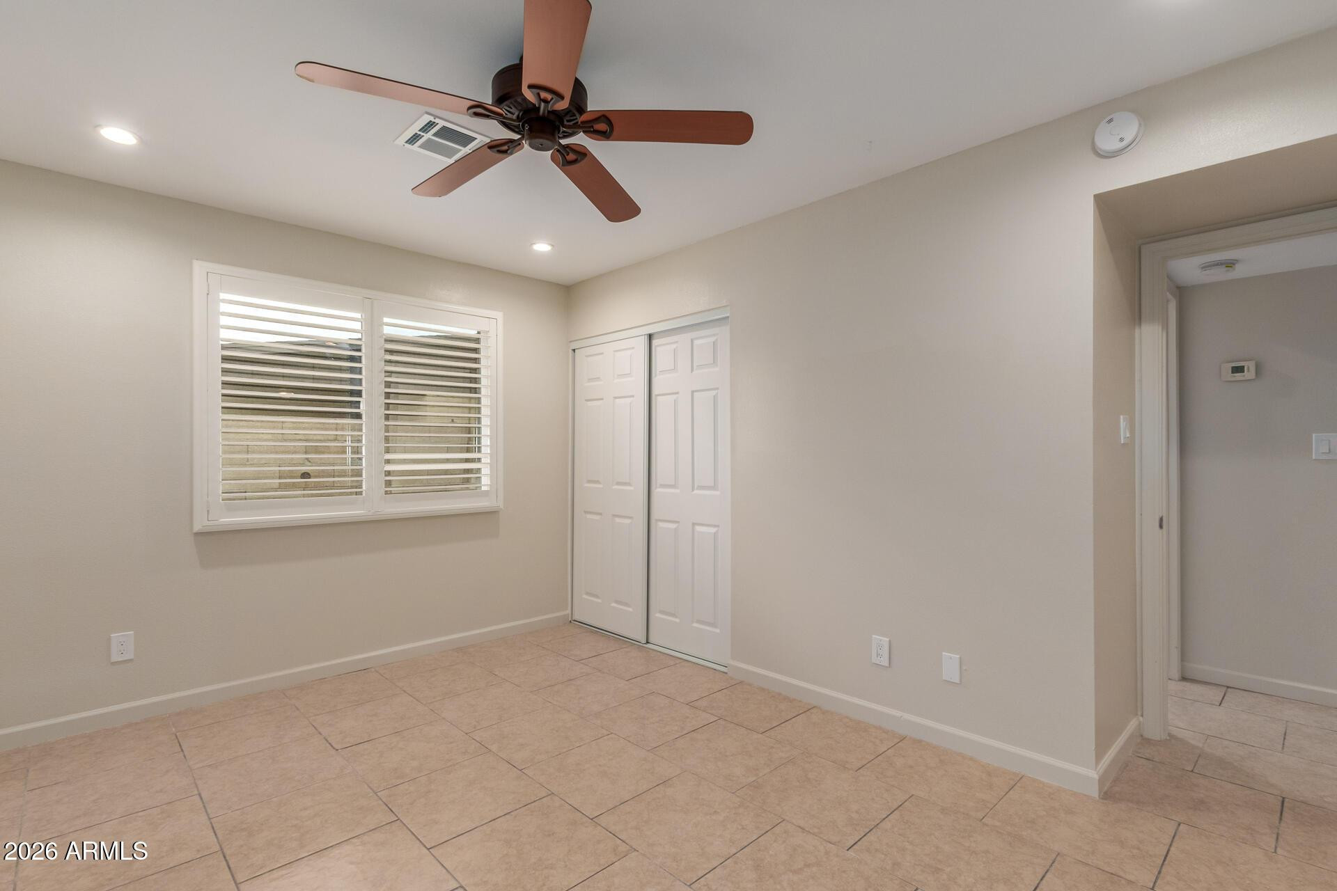 1628 East Del Rio Drive Tempe, AZ 85282 - Photo 17 of 32 a view of an empty room with a window