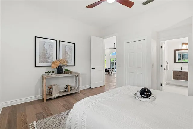 a bedroom with furniture and window