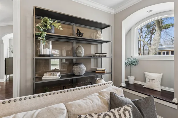 a bedroom with a bed and a tv