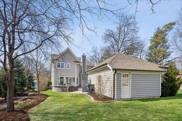 an aerial view of residential house with outdoor space