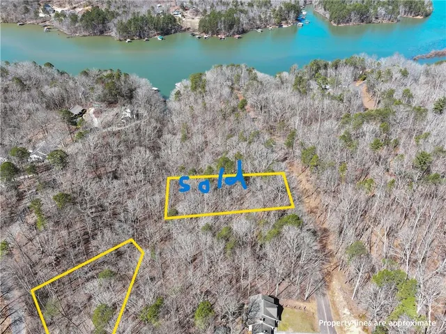 a sign board with an outdoor space