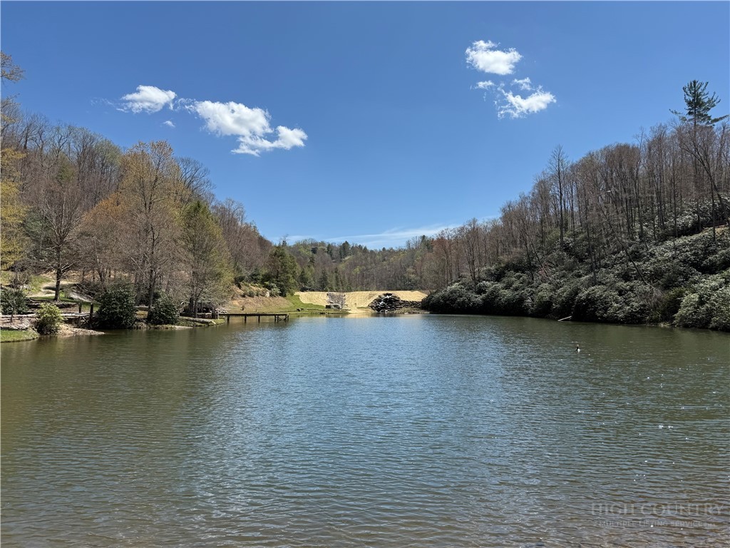 0 Beaver Dam Road Elk Park, NC 28622 - Photo 6 of 14 a view of a lake with a city