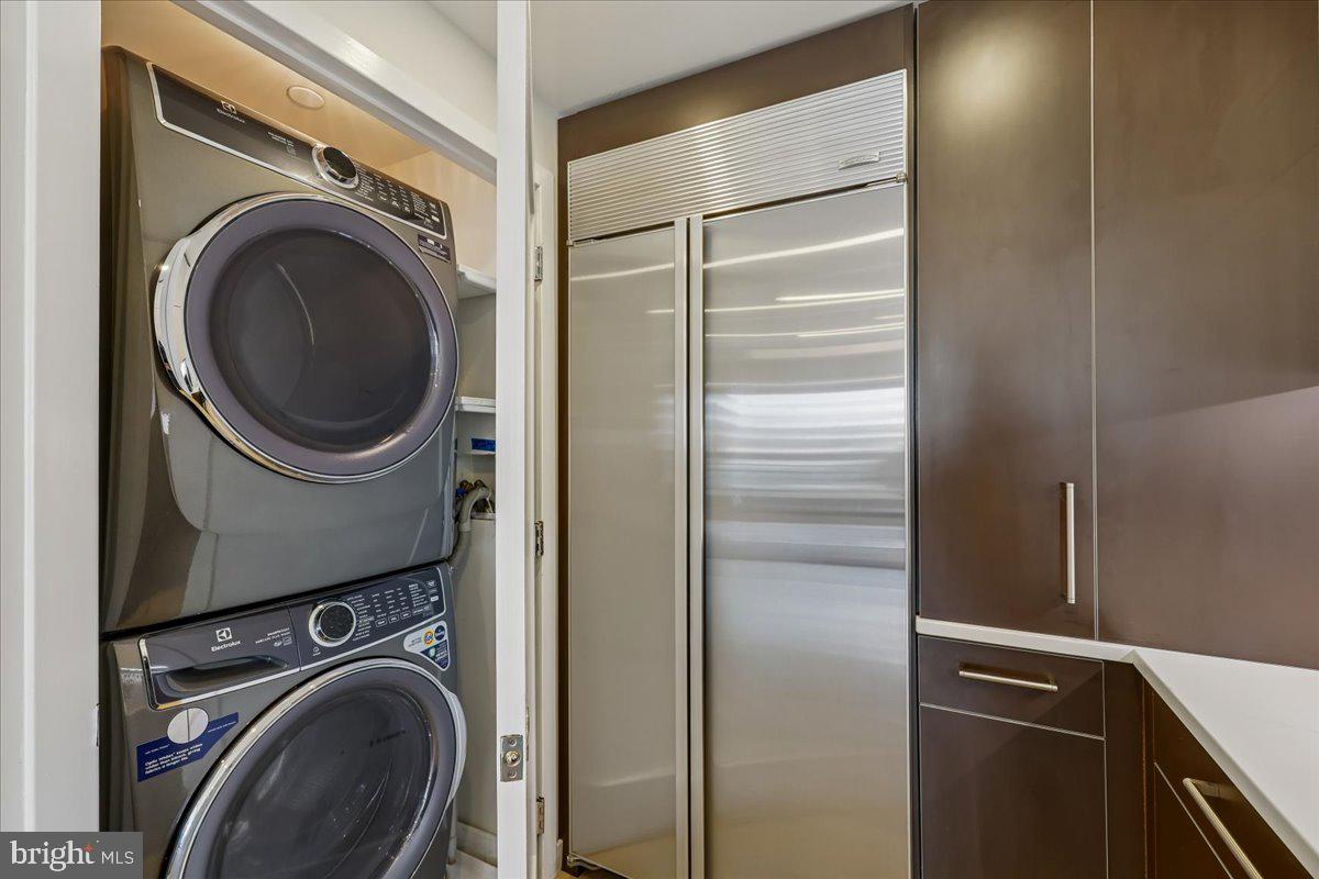 5600 Wisconsin Avenue, Unit 705 Chevy Chase, MD 20815 - Photo 17 of 62 a close up view of a washer and dryer in a washer