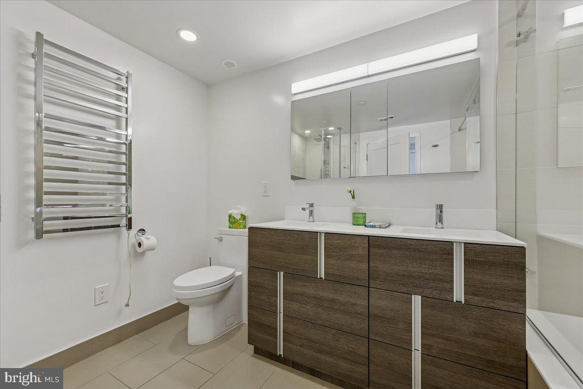 5600 Wisconsin Avenue, Unit 705 Chevy Chase, MD 20815 - Photo 28 of 62 a view of bathroom with a sink and a toilet