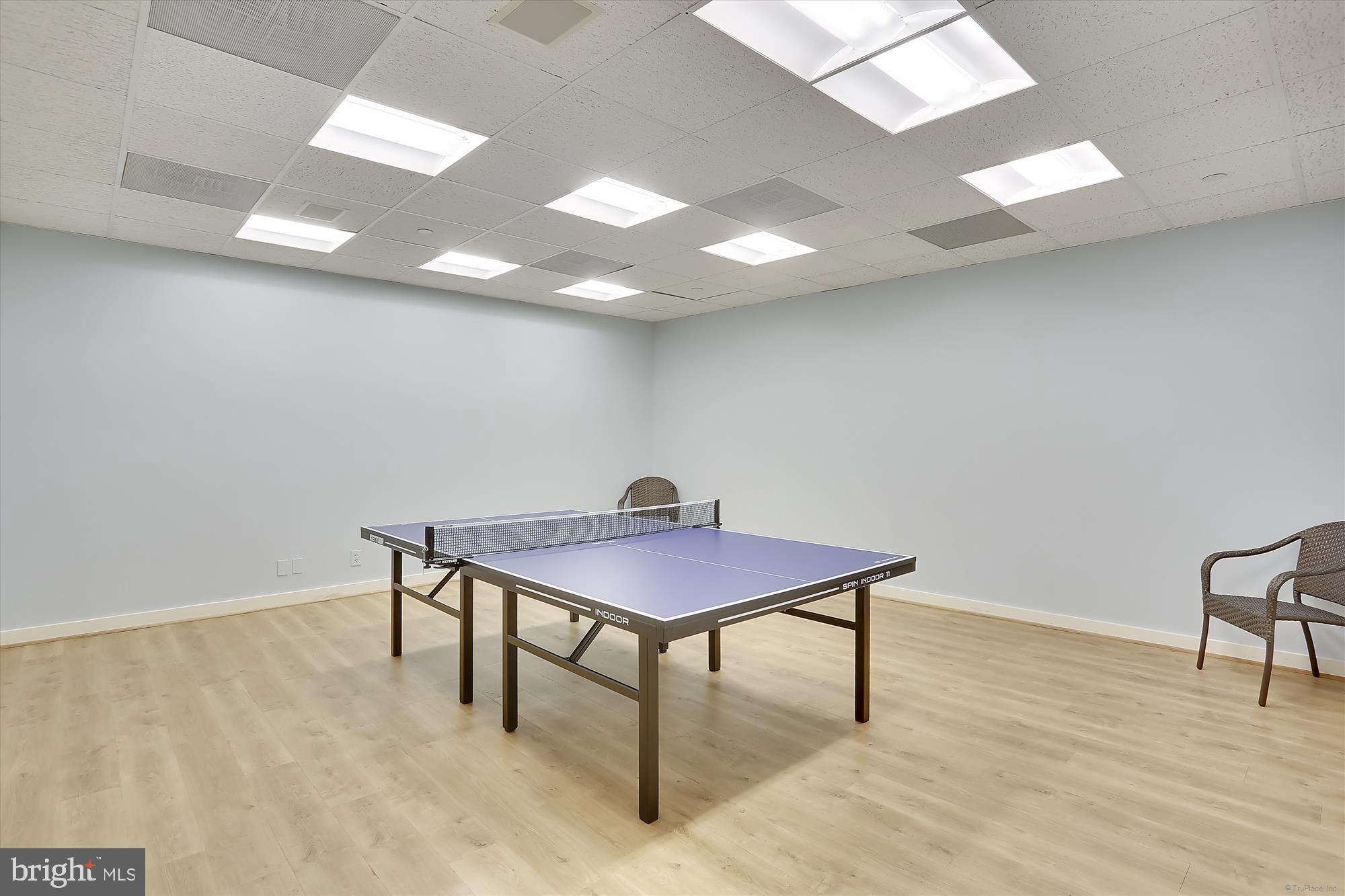 5600 Wisconsin Avenue, Unit 705 Chevy Chase, MD 20815 - Photo 50 of 62 a view of a room with furniture and wooden floor